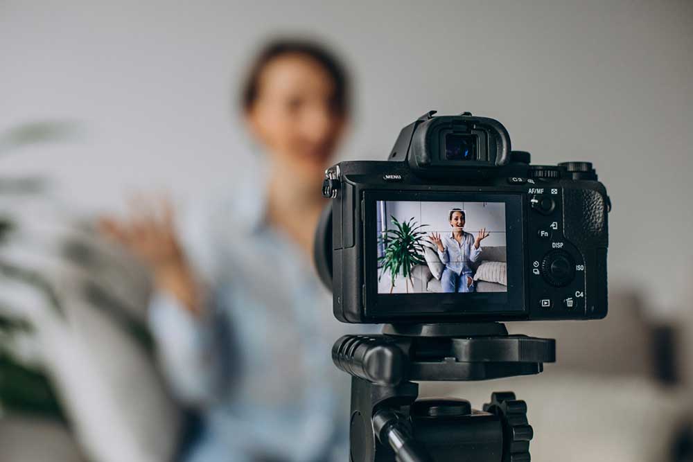 video camera filming a person